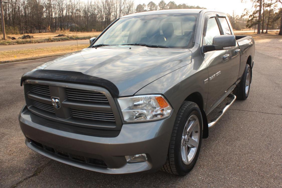 2012 Mineral Gray Metallic Clear Coat /Gray Dodge Ram 1500 Sport Quad Cab 4WD (1C6RD7HT4CS) with an 5.7L V8 OHV 16V engine, 6-Speed Automatic transmission, located at 401 First NE, Bearden, AR, 71720, (870) 687-3414, 33.726528, -92.611519 - Photo #0
