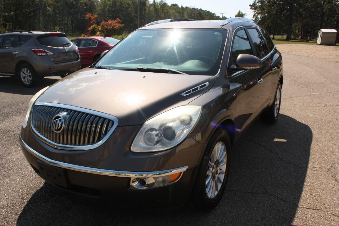2012 Cocoa Metallic /tan Buick Enclave Leather FWD (5GAKRCED3CJ) with an 3.6L V6 DOHC 24V engine, 6-Speed Automatic Overdrive transmission, located at 401 First NE, Bearden, AR, 71720, (870) 687-3414, 33.726528, -92.611519 - Photo #0