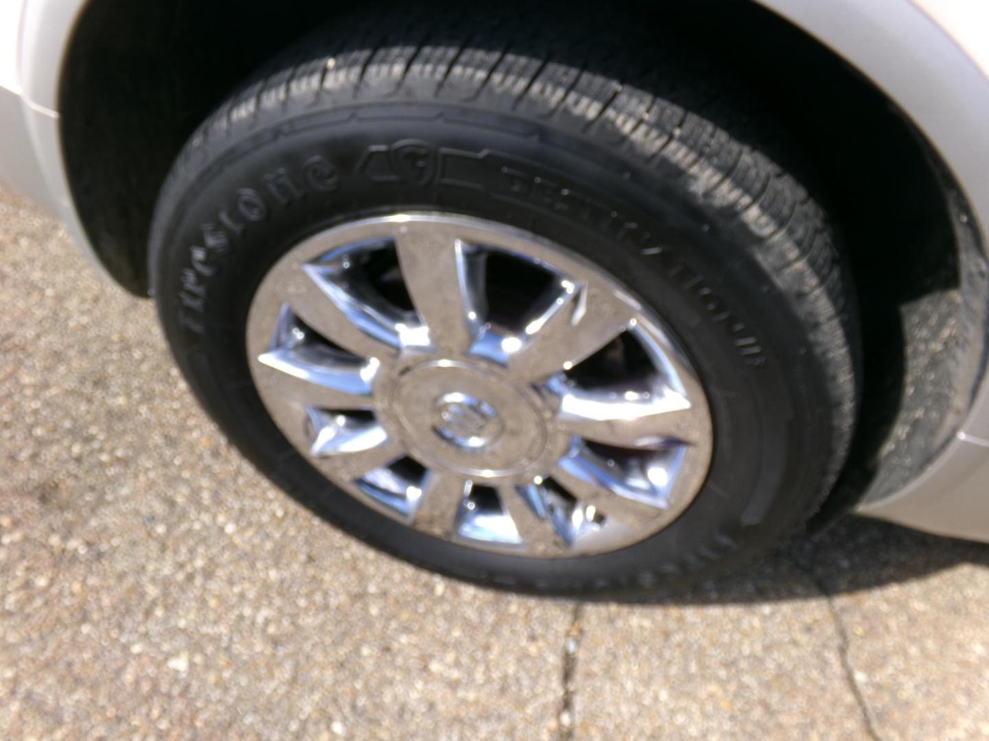 2012 White Diamond Pearl /Tan Buick Enclave Premium AWD (5GAKVDED1CJ) with an 3.6L V6 DOHC 24V engine, 6-Speed Automatic Overdrive transmission, located at 401 First NE, Bearden, AR, 71720, (870) 687-3414, 33.726528, -92.611519 - Photo#7