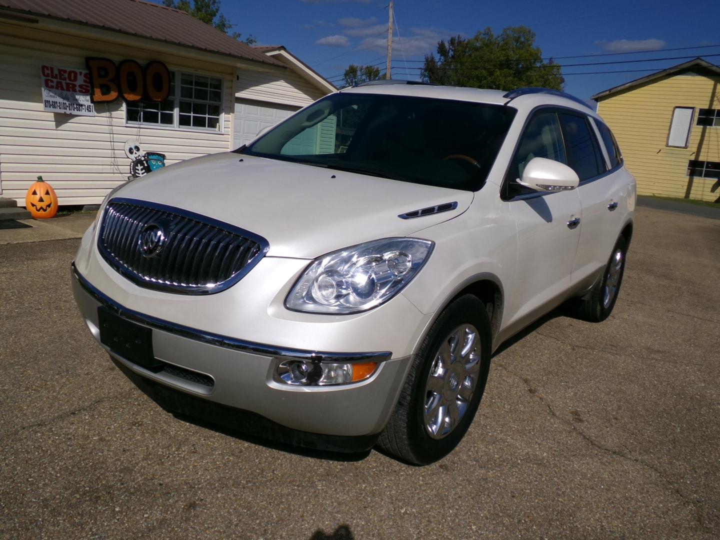 2012 White Diamond Pearl /Tan Buick Enclave Premium AWD (5GAKVDED1CJ) with an 3.6L V6 DOHC 24V engine, 6-Speed Automatic Overdrive transmission, located at 401 First NE, Bearden, AR, 71720, (870) 687-3414, 33.726528, -92.611519 - Photo#24