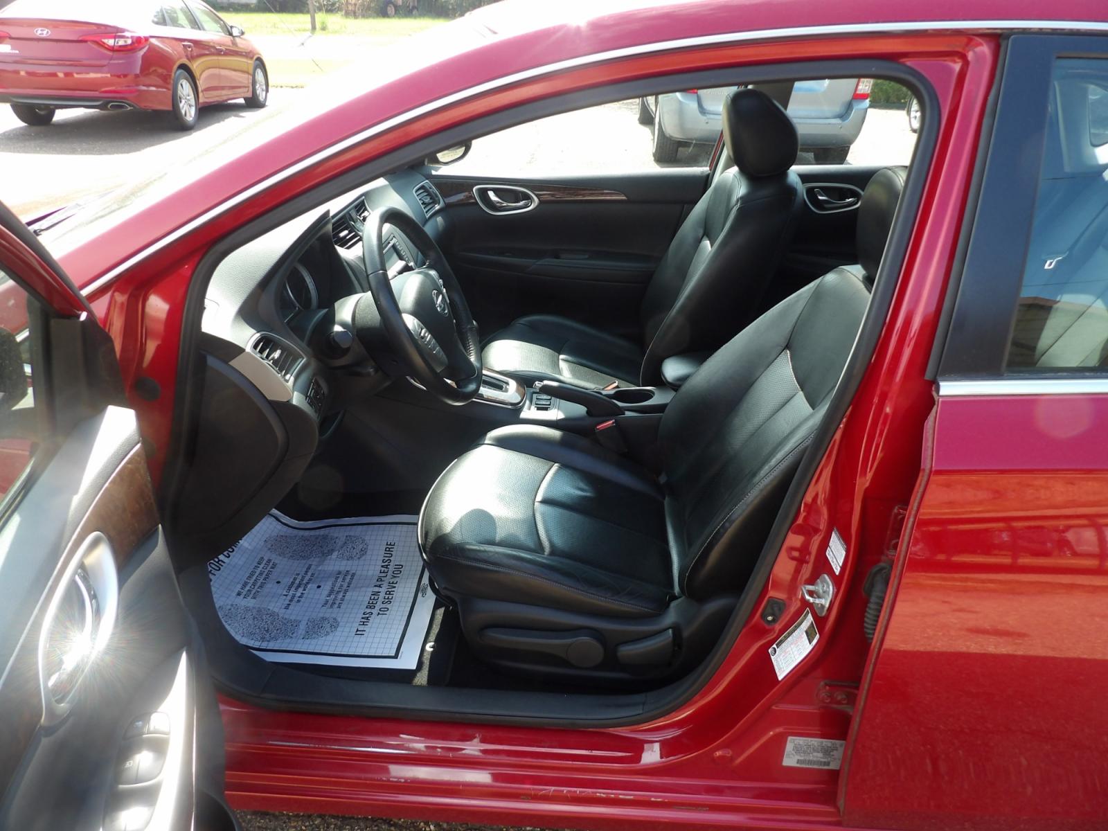 2014 Carmine Red Metallic /Black Nissan Sentra S 6MT (3N1AB7AP5EL) with an 1.8L L4 SFI DOHC 16V engine, 6-Speed Automatic transmission, located at 401 First NE, Bearden, AR, 71720, (870) 687-3414, 33.726528, -92.611519 - Photo #7