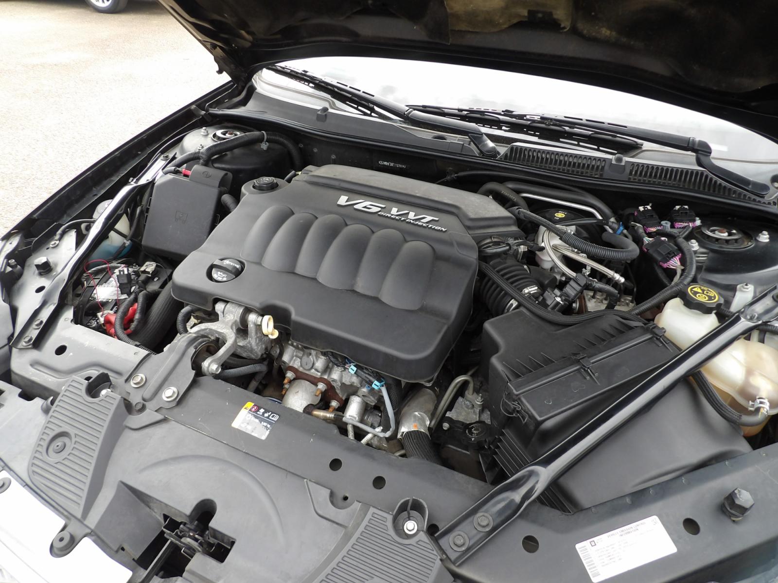 2014 Black /Gray Chevrolet Impala LT (2G1WB5E30E1) with an 3.6L V6 DOHC 16V FFV engine, 6-Speed Automatic transmission, located at 401 First NE, Bearden, AR, 71720, (870) 687-3414, 33.726528, -92.611519 - Photo #5