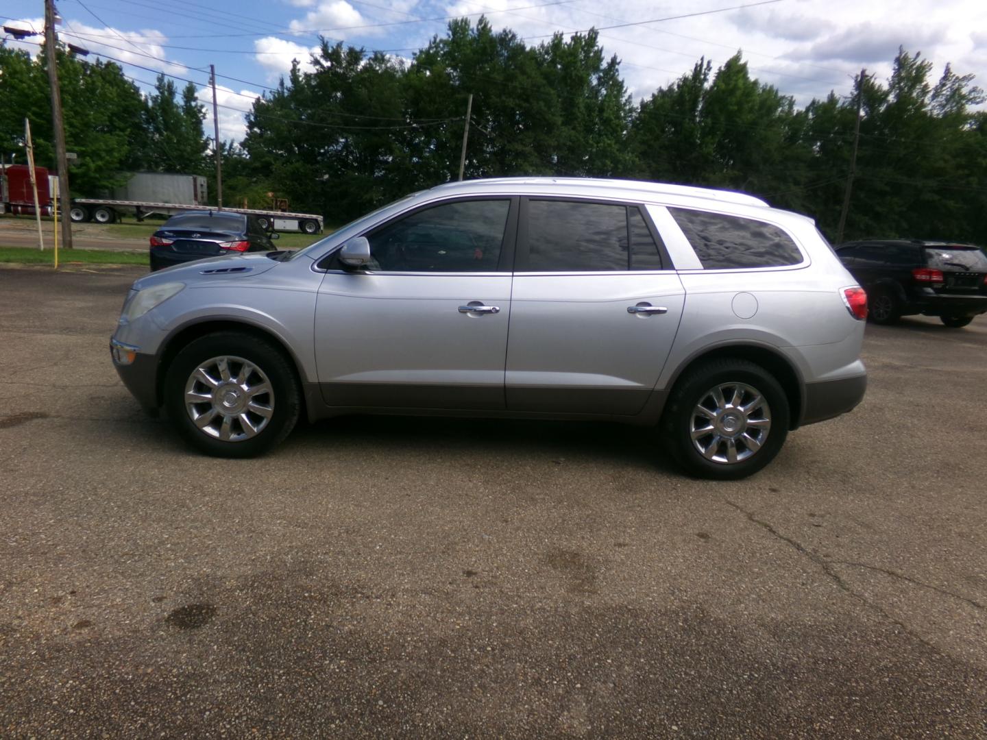 2012 Switchblade Silver /Brown Buick Enclave CXL (5GAKRCED1CJ) with an 3.6L engine, automatic transmission, located at 401 First NE, Bearden, AR, 71720, (870) 687-3414, 33.726528, -92.611519 - Photo#1