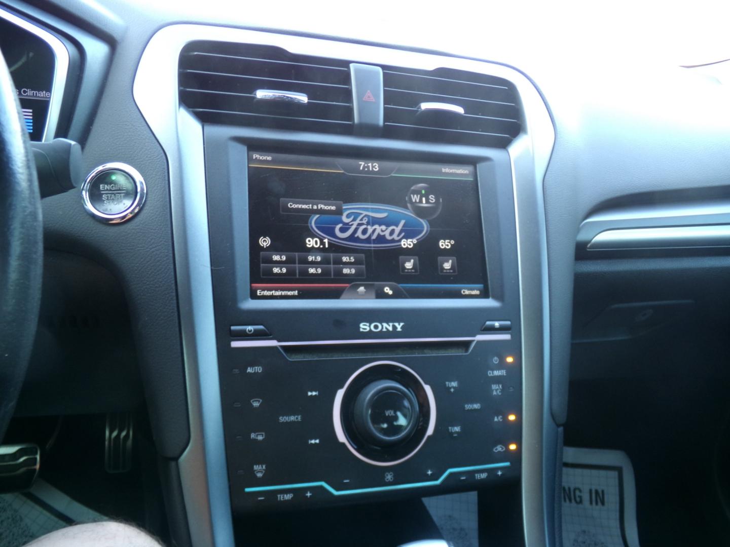 2015 Magnetic Metallic /Black Ford Fusion Titanium (3FA6P0K97FR) with an 2.5L Ecoboost engine, automatic transmission, located at 401 First NE, Bearden, AR, 71720, (870) 687-3414, 33.726528, -92.611519 - Photo#10