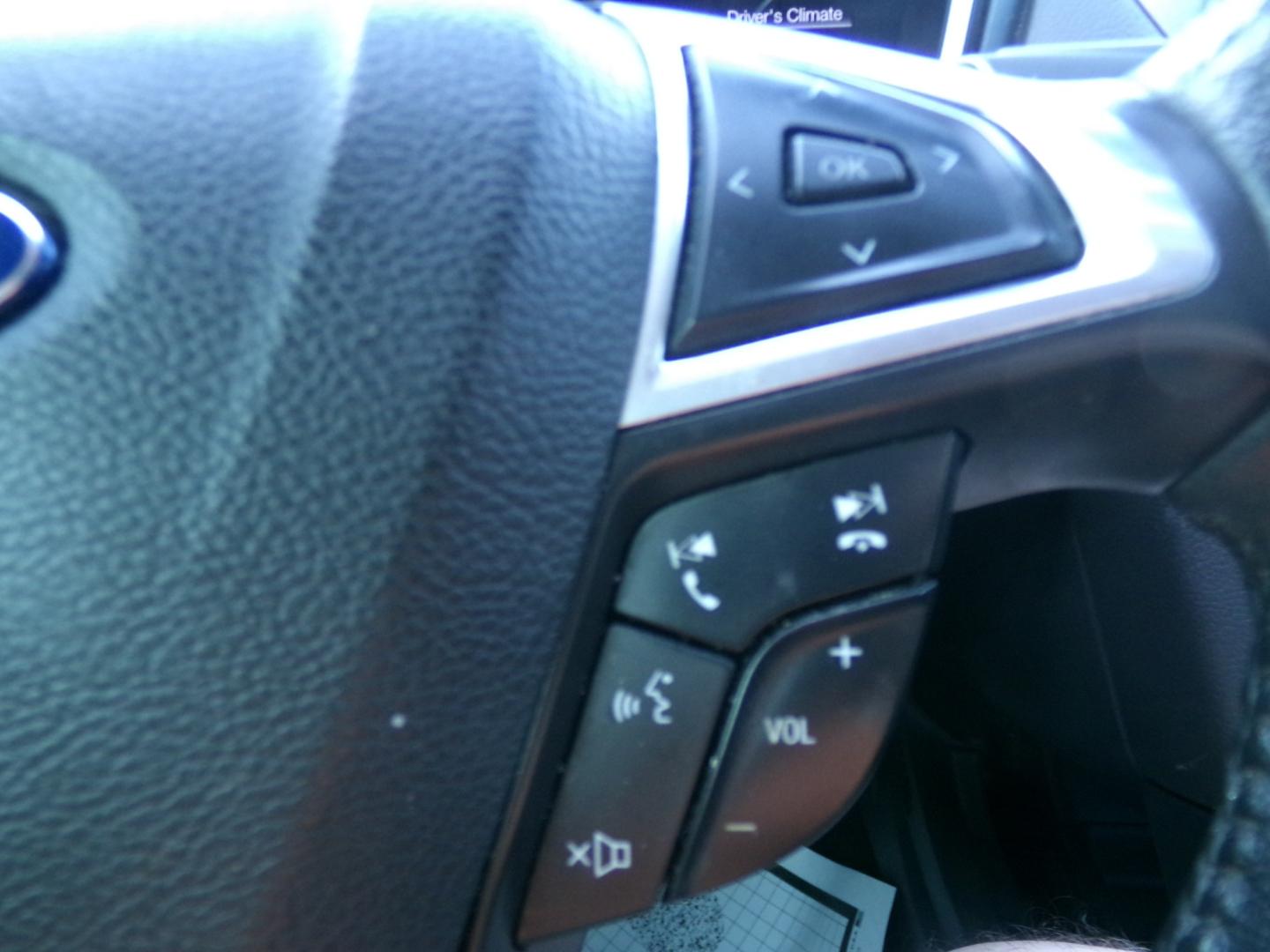 2015 Magnetic Metallic /Black Ford Fusion Titanium (3FA6P0K97FR) with an 2.5L Ecoboost engine, automatic transmission, located at 401 First NE, Bearden, AR, 71720, (870) 687-3414, 33.726528, -92.611519 - Photo#15