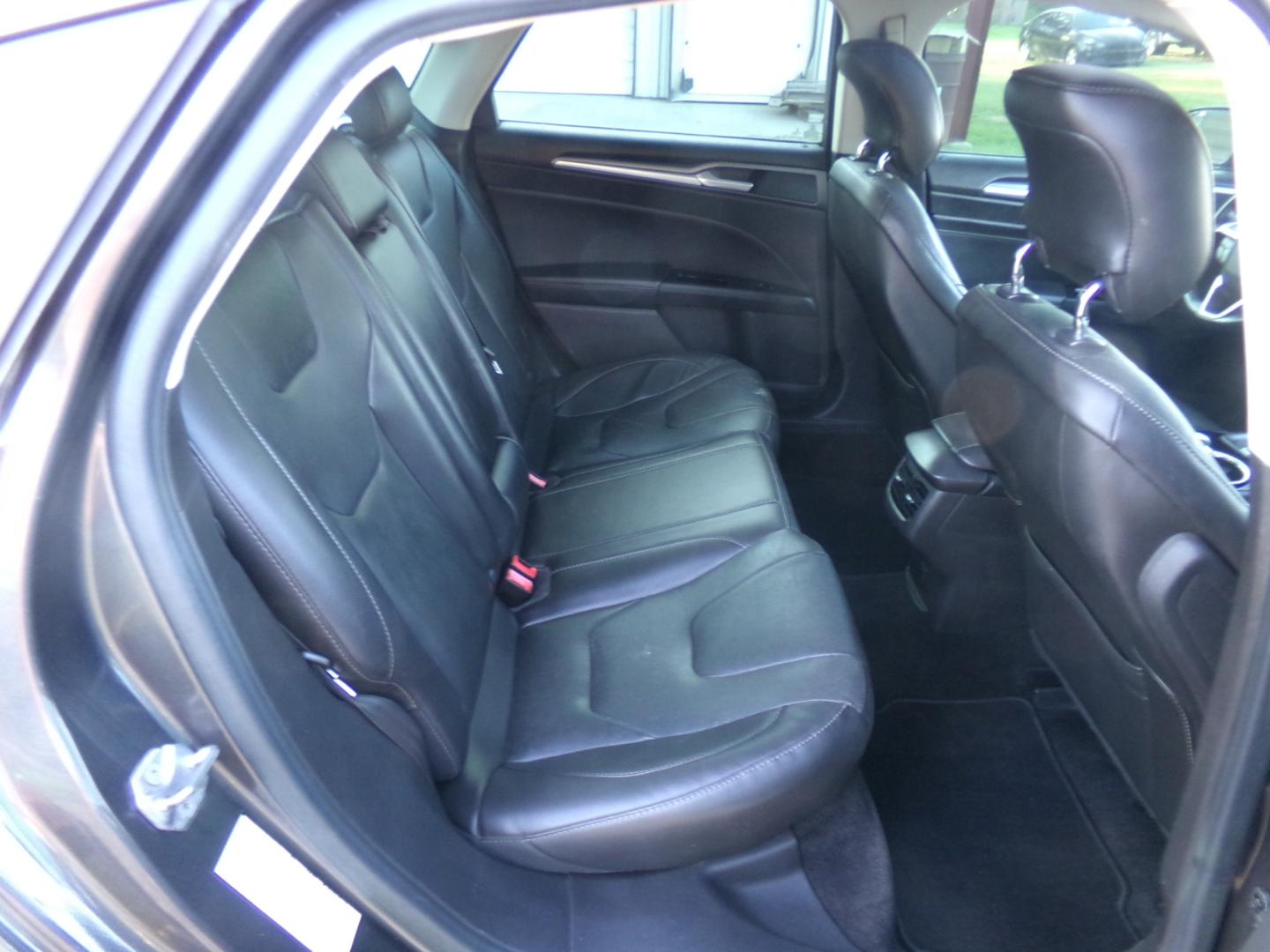 2015 Magnetic Metallic /Black Ford Fusion Titanium (3FA6P0K97FR) with an 2.5L Ecoboost engine, automatic transmission, located at 401 First NE, Bearden, AR, 71720, (870) 687-3414, 33.726528, -92.611519 - Photo#18