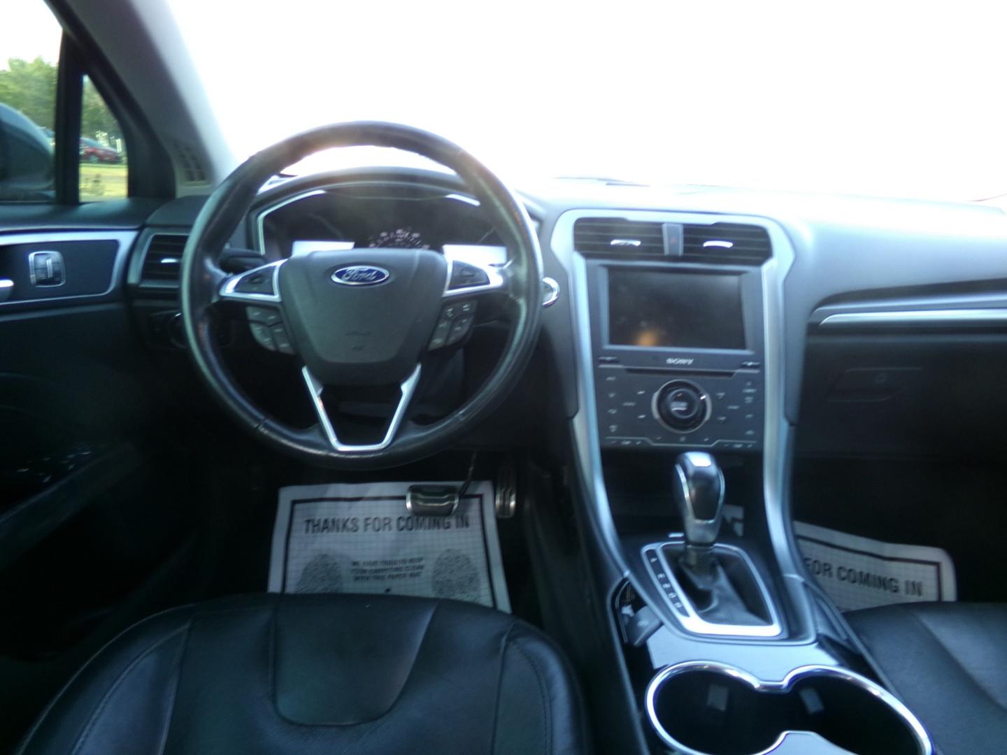 2015 Magnetic Metallic /Black Ford Fusion Titanium (3FA6P0K97FR) with an 2.5L Ecoboost engine, automatic transmission, located at 401 First NE, Bearden, AR, 71720, (870) 687-3414, 33.726528, -92.611519 - Photo#21
