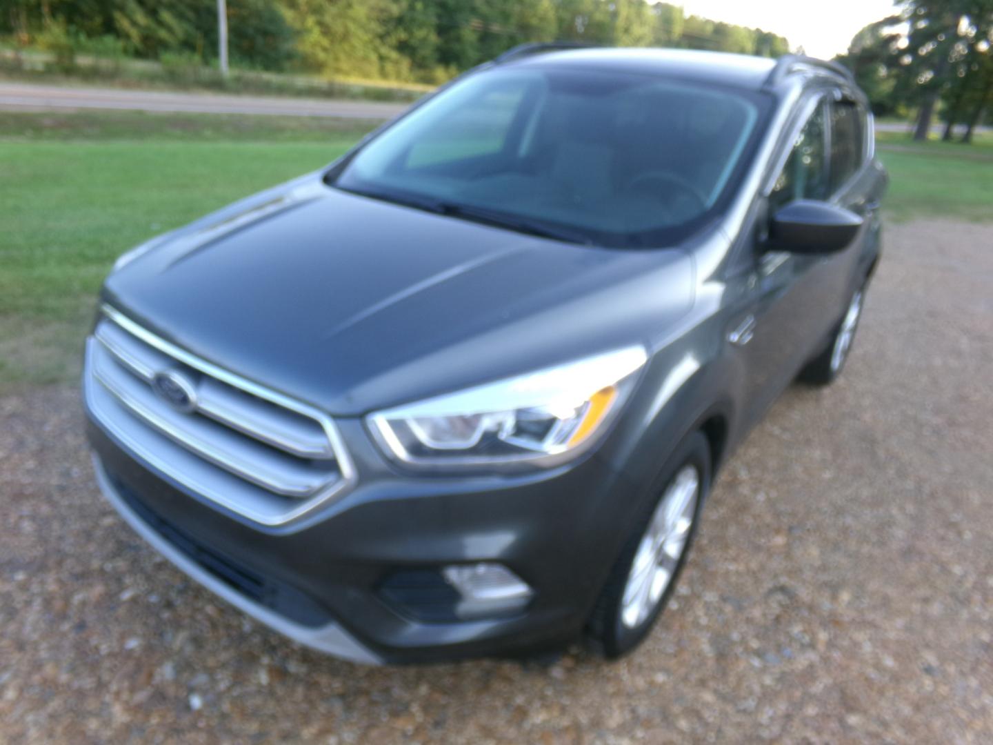 2017 Sterling Gray Metallic /Gray Ford Escape SE (1FMCU0GD6HU) with an 1.6L Ecoboost engine, automatic transmission, located at 401 First NE, Bearden, AR, 71720, (870) 687-3414, 33.726528, -92.611519 - Photo#0