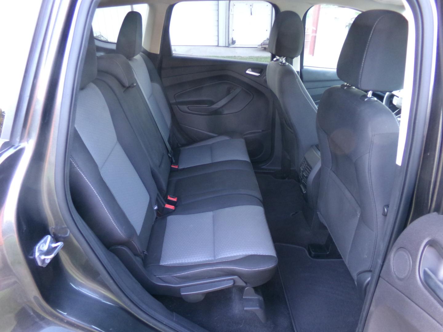 2017 Sterling Gray Metallic /Gray Ford Escape SE (1FMCU0GD6HU) with an 1.6L Ecoboost engine, automatic transmission, located at 401 First NE, Bearden, AR, 71720, (870) 687-3414, 33.726528, -92.611519 - Photo#15