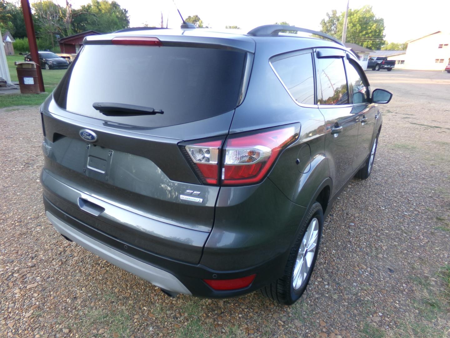 2017 Sterling Gray Metallic /Gray Ford Escape SE (1FMCU0GD6HU) with an 1.6L Ecoboost engine, automatic transmission, located at 401 First NE, Bearden, AR, 71720, (870) 687-3414, 33.726528, -92.611519 - Photo#18
