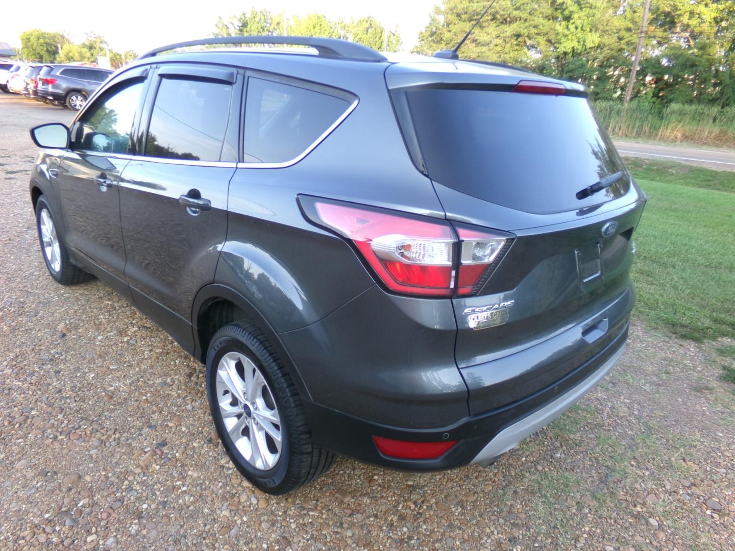 2017 Sterling Gray Metallic /Gray Ford Escape SE (1FMCU0GD6HU) with an 1.6L Ecoboost engine, automatic transmission, located at 401 First NE, Bearden, AR, 71720, (870) 687-3414, 33.726528, -92.611519 - Photo#2