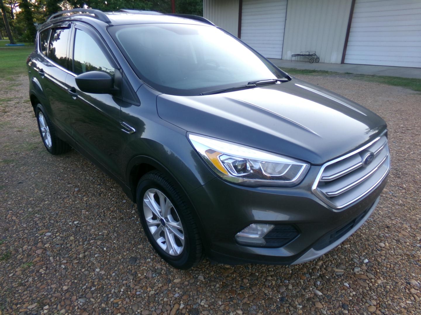 2017 Sterling Gray Metallic /Gray Ford Escape SE (1FMCU0GD6HU) with an 1.6L Ecoboost engine, automatic transmission, located at 401 First NE, Bearden, AR, 71720, (870) 687-3414, 33.726528, -92.611519 - Photo#21