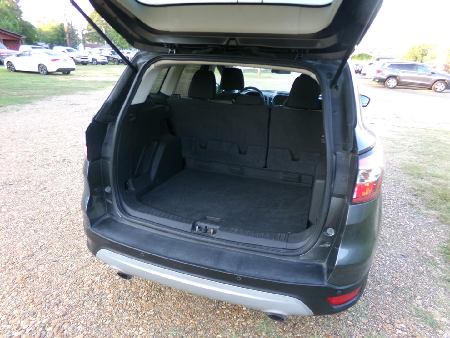 2017 Sterling Gray Metallic /Gray Ford Escape SE (1FMCU0GD6HU) with an 1.6L Ecoboost engine, automatic transmission, located at 401 First NE, Bearden, AR, 71720, (870) 687-3414, 33.726528, -92.611519 - Photo#3