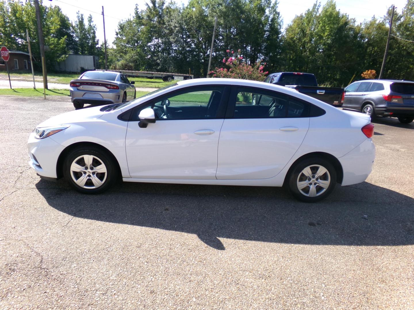 2018 /Charcoal Chevrolet Cruze LS Auto (1G1BC5SM4J7) with an 1.4L L4 DOHC 16V TURBO engine, 6A transmission, located at 401 First NE, Bearden, AR, 71720, (870) 687-3414, 33.726528, -92.611519 - CARFAX-CERTIFIED ONE OWNER! ONLY 80K MILES! - Photo#1