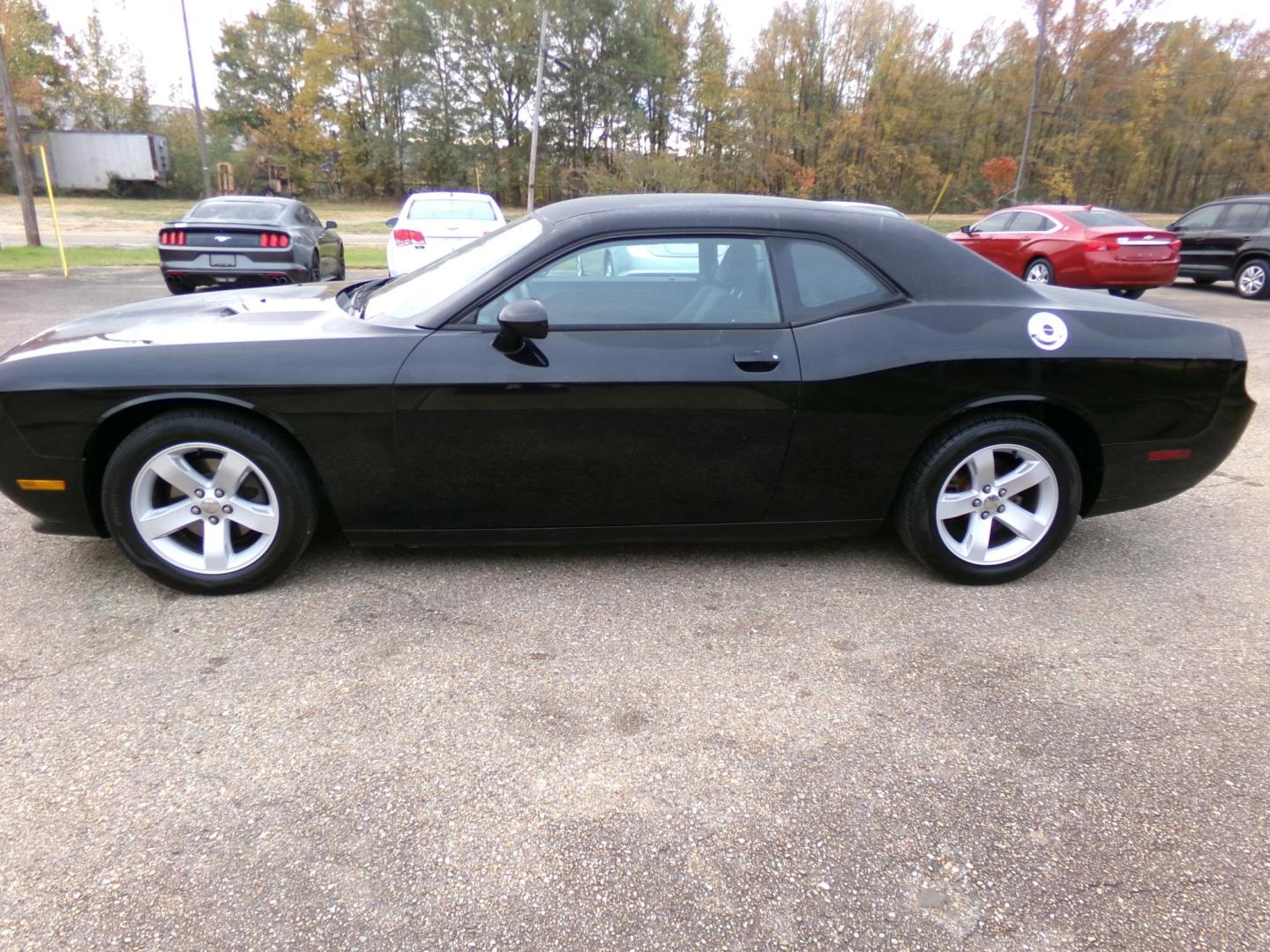 2012 Dodge Challenger SXT (2C3CDYAG5CH) with an 3.6L V6 DOHC 24V engine, 4-Speed Automatic transmission, located at 401 First NE, Bearden, AR, 71720, (870) 687-3414, 33.726528, -92.611519 - Photo#1