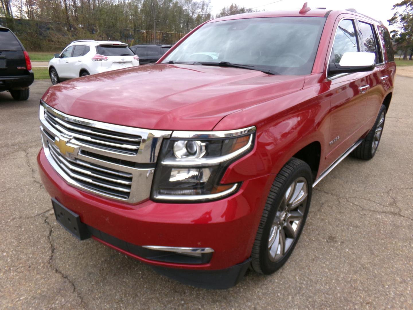 2015 Crystal Red Tintcoat /Tan Chevrolet Tahoe LTZ 4WD (1GNSKCKC1FR) with an 5.3L V8 OHV 16V engine, 6-Speed Automatic transmission, located at 401 First NE, Bearden, AR, 71720, (870) 687-3414, 33.726528, -92.611519 - Photo#0