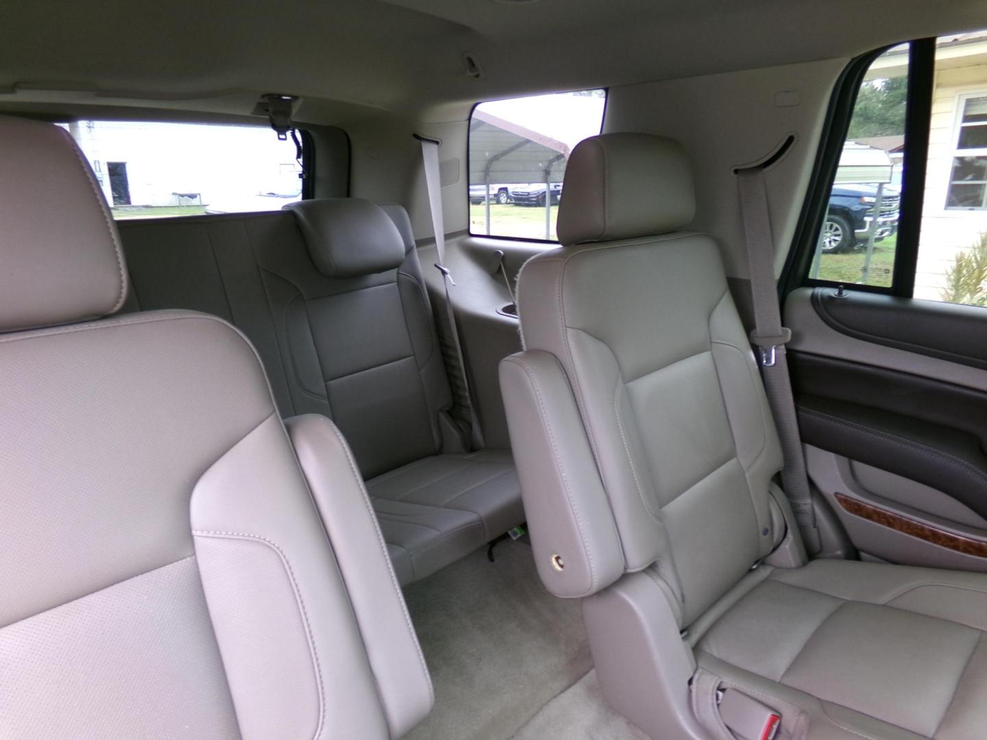 2015 Crystal Red Tintcoat /Tan Chevrolet Tahoe LTZ 4WD (1GNSKCKC1FR) with an 5.3L V8 OHV 16V engine, 6-Speed Automatic transmission, located at 401 First NE, Bearden, AR, 71720, (870) 687-3414, 33.726528, -92.611519 - Photo#20