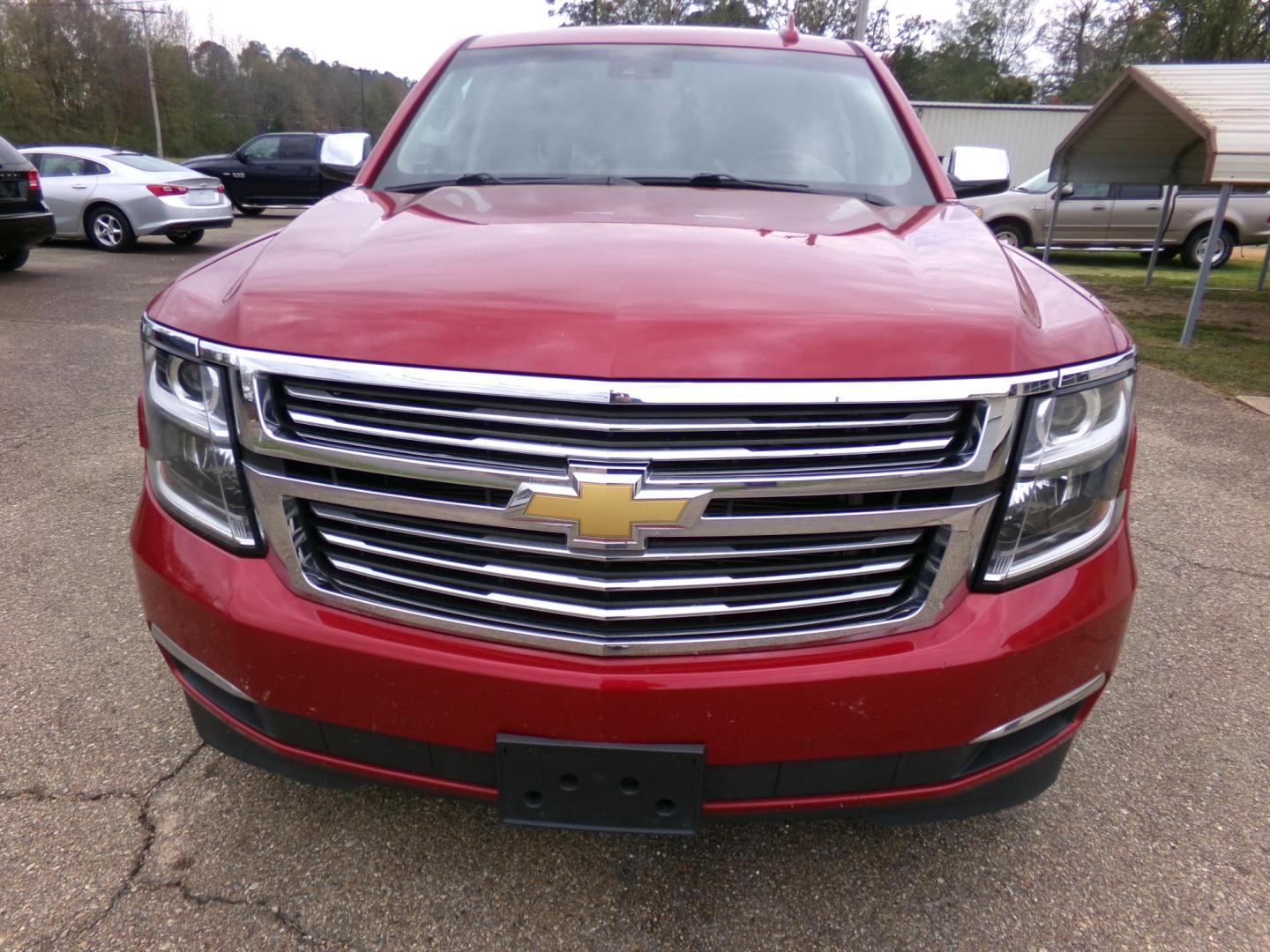 2015 Crystal Red Tintcoat /Tan Chevrolet Tahoe LTZ 4WD (1GNSKCKC1FR) with an 5.3L V8 OHV 16V engine, 6-Speed Automatic transmission, located at 401 First NE, Bearden, AR, 71720, (870) 687-3414, 33.726528, -92.611519 - Photo#27