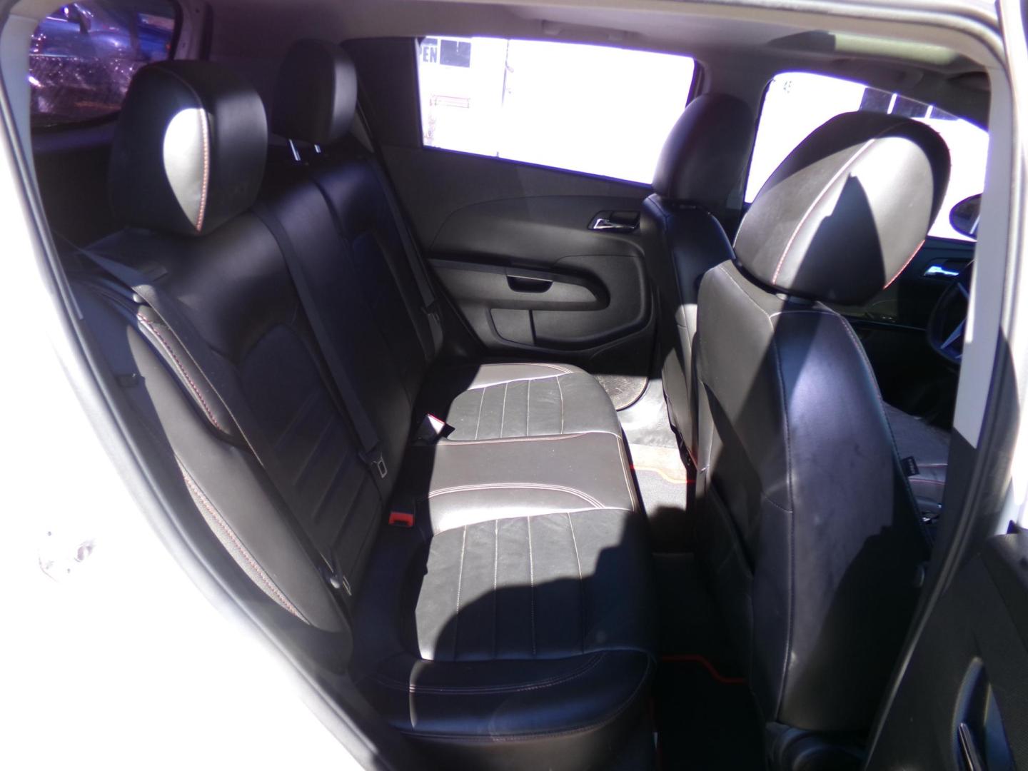 2015 White Diamond Pearl /Black Chevrolet Sonic RS Auto 5-Door (1G1JG6SB7F4) with an 1.4L L4 DOHC 24V TURBO engine, 6A transmission, located at 401 First NE, Bearden, AR, 71720, (870) 687-3414, 33.726528, -92.611519 - Photo#17