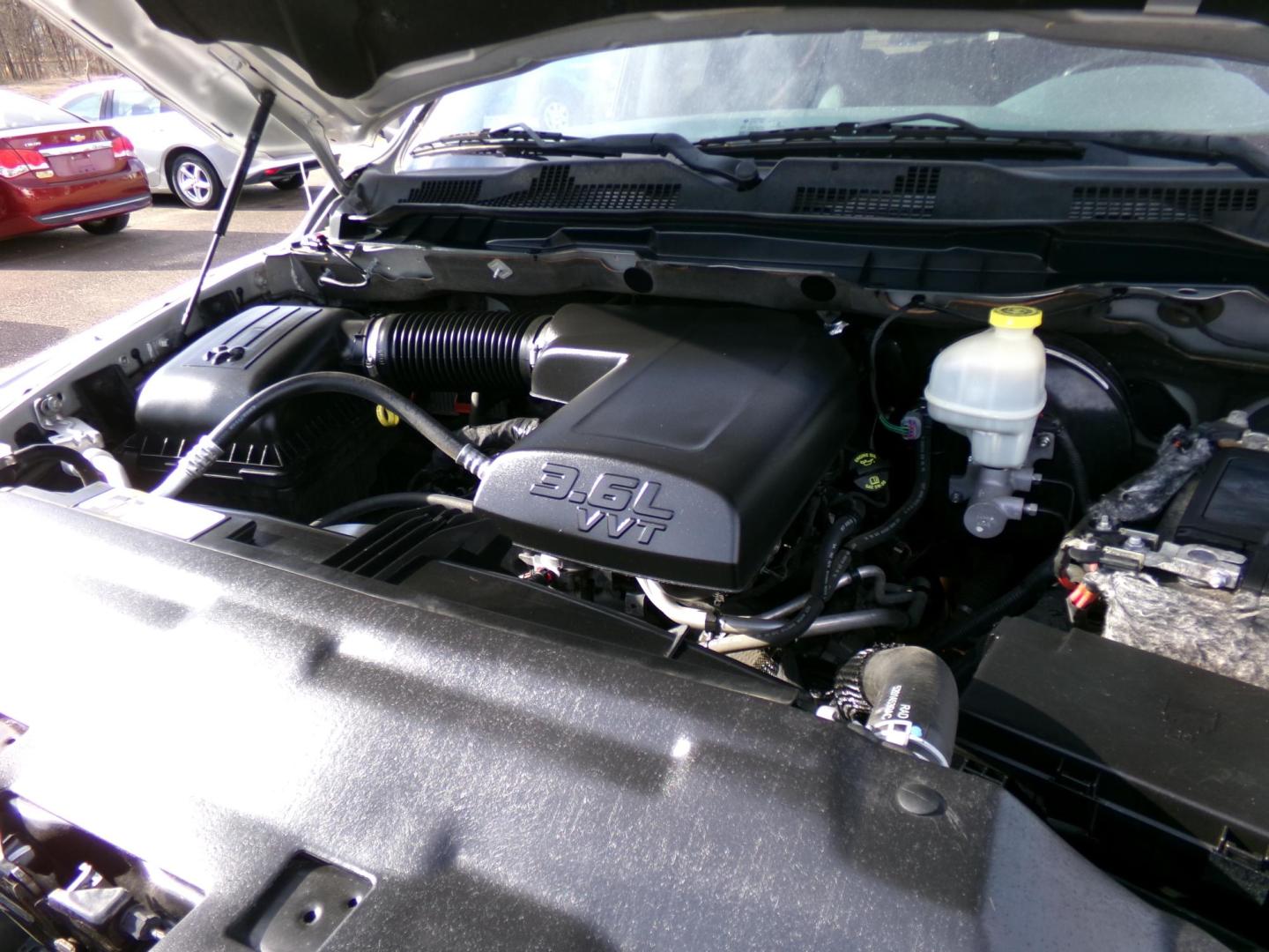 2014 Silver /Gray RAM 1500 Tradesman Quad Cab 2WD (1C6RR6FG9ES) with an 3.6L V6 DOHC 24V FFV engine, 6-Speed Automatic transmission, located at 401 First NE, Bearden, AR, 71720, (870) 687-3414, 33.726528, -92.611519 - Photo#4