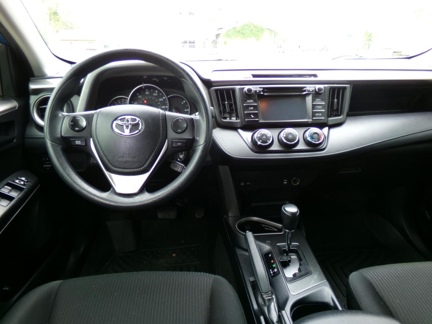 2016 Electric Storm Blue /Charcoal Toyota RAV4 LE FWD (JTMZFREV1GJ) with an 2.5L L4 DOHC 16V engine, 6-speed automatic transmission, located at 401 First NE, Bearden, AR, 71720, (870) 687-3414, 33.726528, -92.611519 - Photo#14