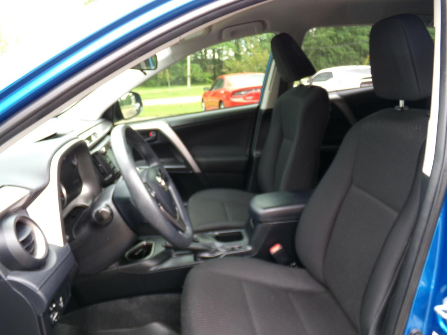 2016 Electric Storm Blue /Charcoal Toyota RAV4 LE FWD (JTMZFREV1GJ) with an 2.5L L4 DOHC 16V engine, 6-speed automatic transmission, located at 401 First NE, Bearden, AR, 71720, (870) 687-3414, 33.726528, -92.611519 - Photo#7