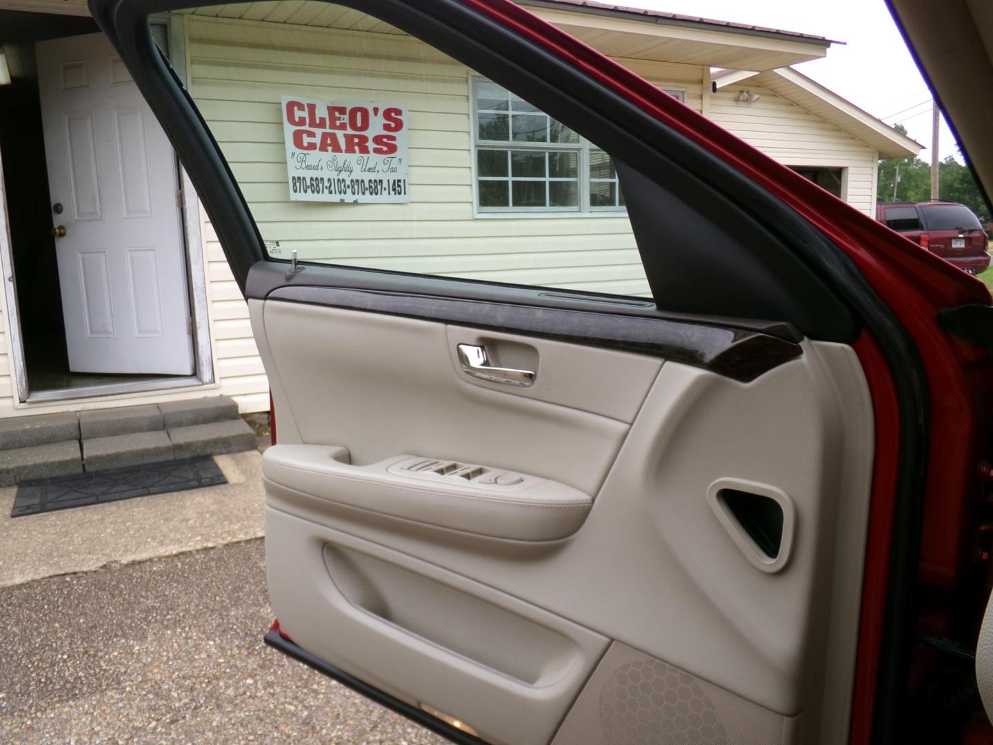 2010 Crystal Claret Tintcoat /Cream Cadillac DTS V8 (1G6KA5EY4AU) with an 4.6L V8 DOHC 32V engine, 4-Speed Automatic transmission, located at 401 First NE, Bearden, AR, 71720, (870) 687-3414, 33.726528, -92.611519 - Photo#6
