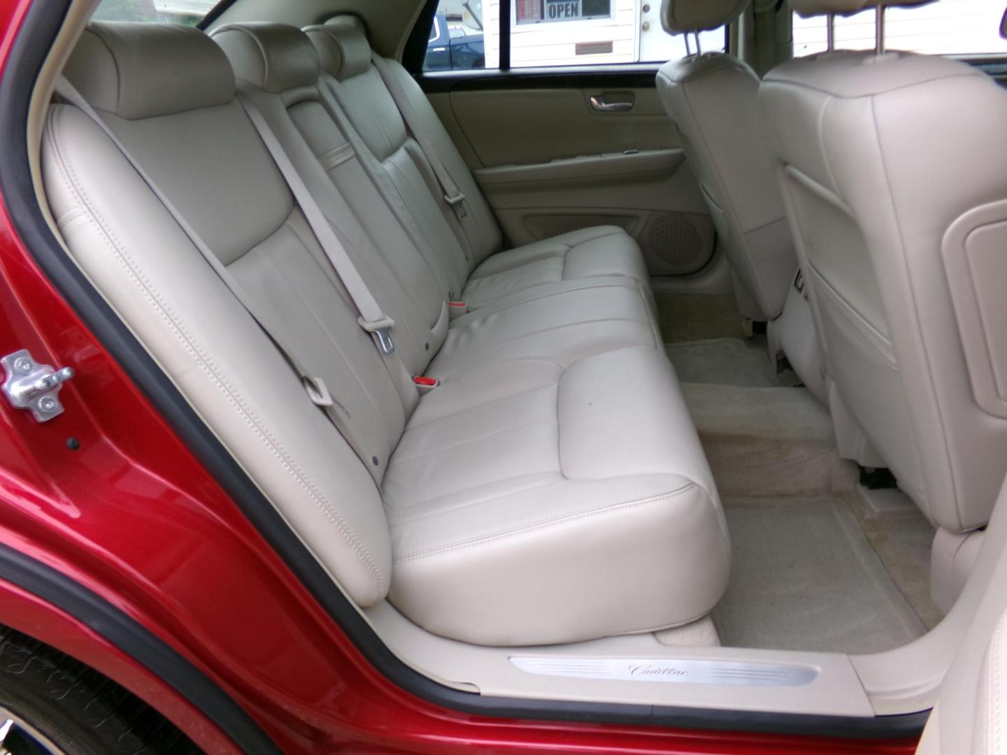 2010 Crystal Claret Tintcoat /Cream Cadillac DTS V8 (1G6KA5EY4AU) with an 4.6L V8 DOHC 32V engine, 4-Speed Automatic transmission, located at 401 First NE, Bearden, AR, 71720, (870) 687-3414, 33.726528, -92.611519 - Photo#13