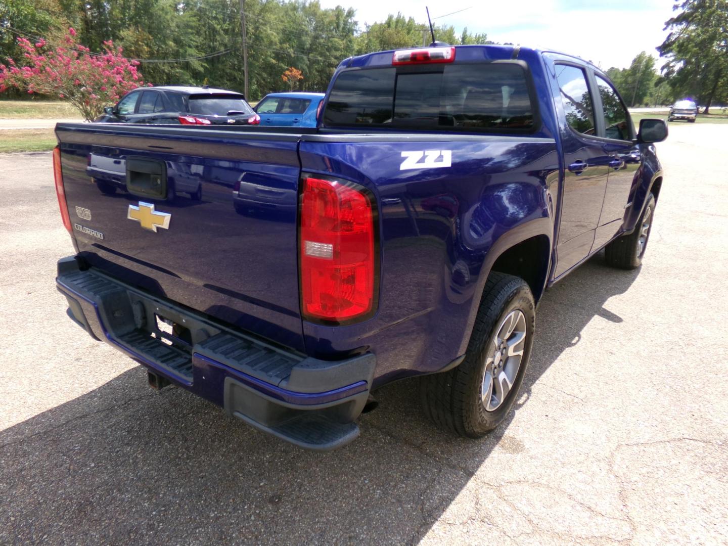 2016 Laser Blue Metallic /Black Chevrolet Colorado Z71 Crew Cab 4WD Long Box (1GCGTDE38G1) with an 3.6L V6 DOHC 24V GAS engine, 6A transmission, located at 401 First NE, Bearden, AR, 71720, (870) 687-3414, 33.726528, -92.611519 - Photo#23