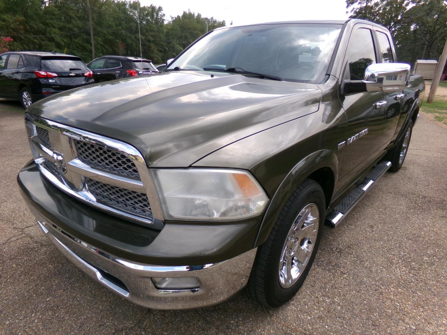 2012 Sarsaparilla Sage Metallic /Tan Dodge Ram 1500 Laramie Quad Cab 2WD (1C6RD6JT1CS) with an 5.7L V8 OHV 16V engine, 6-Speed Automatic transmission, located at 401 First NE, Bearden, AR, 71720, (870) 687-3414, 33.726528, -92.611519 - Photo#0