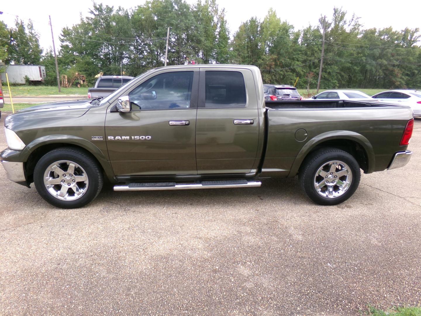 2012 Sarsaparilla Sage Metallic /Tan Dodge Ram 1500 Laramie Quad Cab 2WD (1C6RD6JT1CS) with an 5.7L V8 OHV 16V engine, 6-Speed Automatic transmission, located at 401 First NE, Bearden, AR, 71720, (870) 687-3414, 33.726528, -92.611519 - Photo#1
