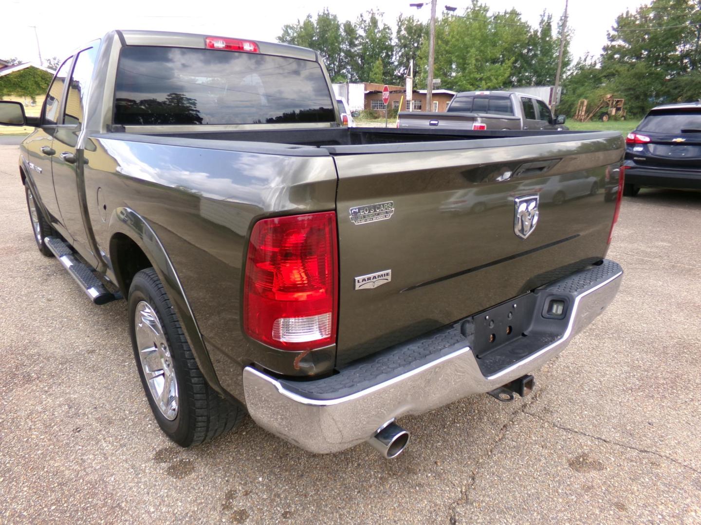 2012 Sarsaparilla Sage Metallic /Tan Dodge Ram 1500 Laramie Quad Cab 2WD (1C6RD6JT1CS) with an 5.7L V8 OHV 16V engine, 6-Speed Automatic transmission, located at 401 First NE, Bearden, AR, 71720, (870) 687-3414, 33.726528, -92.611519 - Photo#2