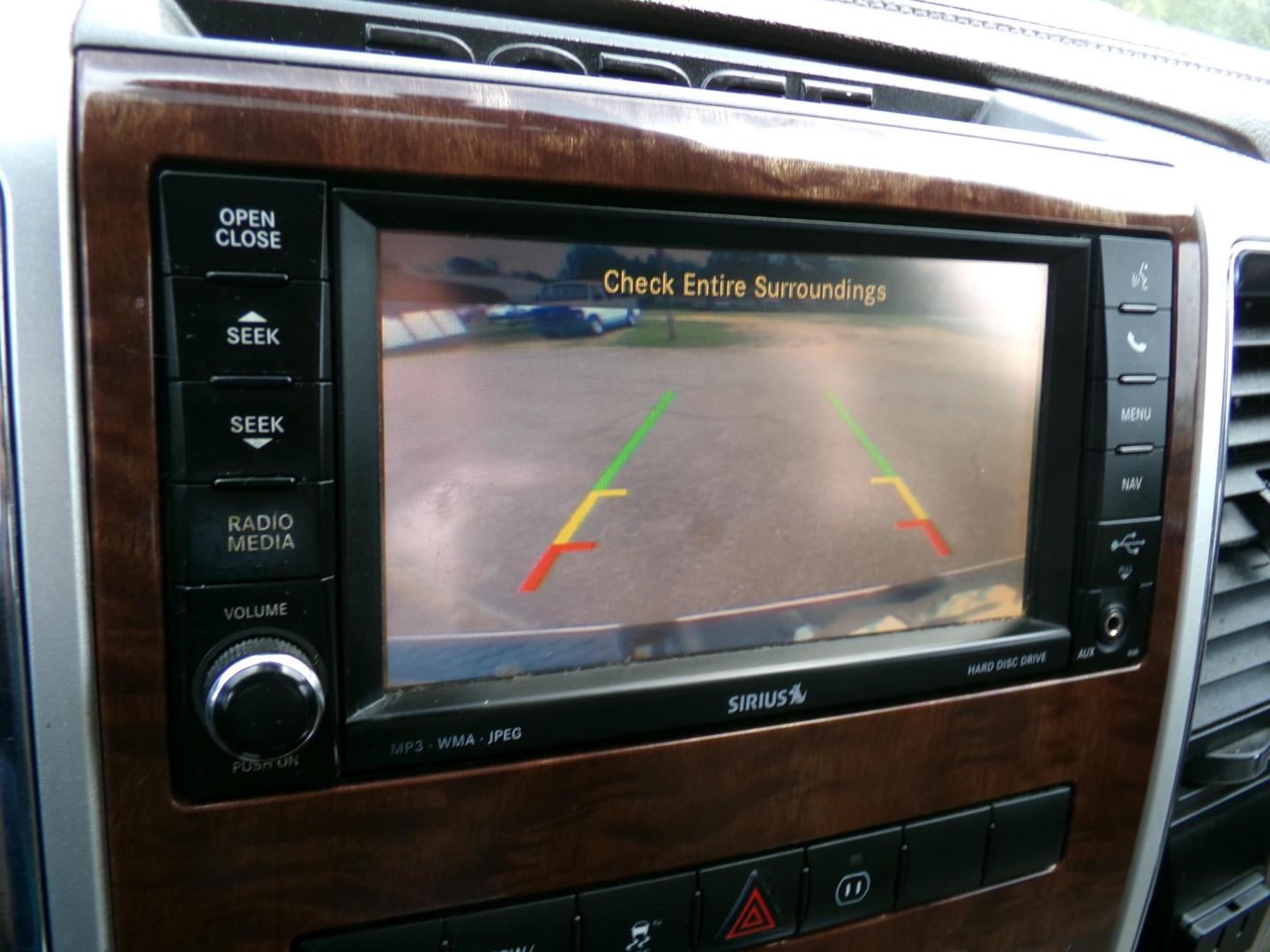 2012 Sarsaparilla Sage Metallic /Tan Dodge Ram 1500 Laramie Quad Cab 2WD (1C6RD6JT1CS) with an 5.7L V8 OHV 16V engine, 6-Speed Automatic transmission, located at 401 First NE, Bearden, AR, 71720, (870) 687-3414, 33.726528, -92.611519 - Photo#15