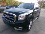2016 Green With Envy Metallic /Tan GMC Yukon SLE 4WD (1GKS2AKC8GR) with an 5.3L V8 OHV 16V engine, 6A transmission, located at 401 First NE, Bearden, AR, 71720, (870) 687-3414, 33.726528, -92.611519 - Photo#0