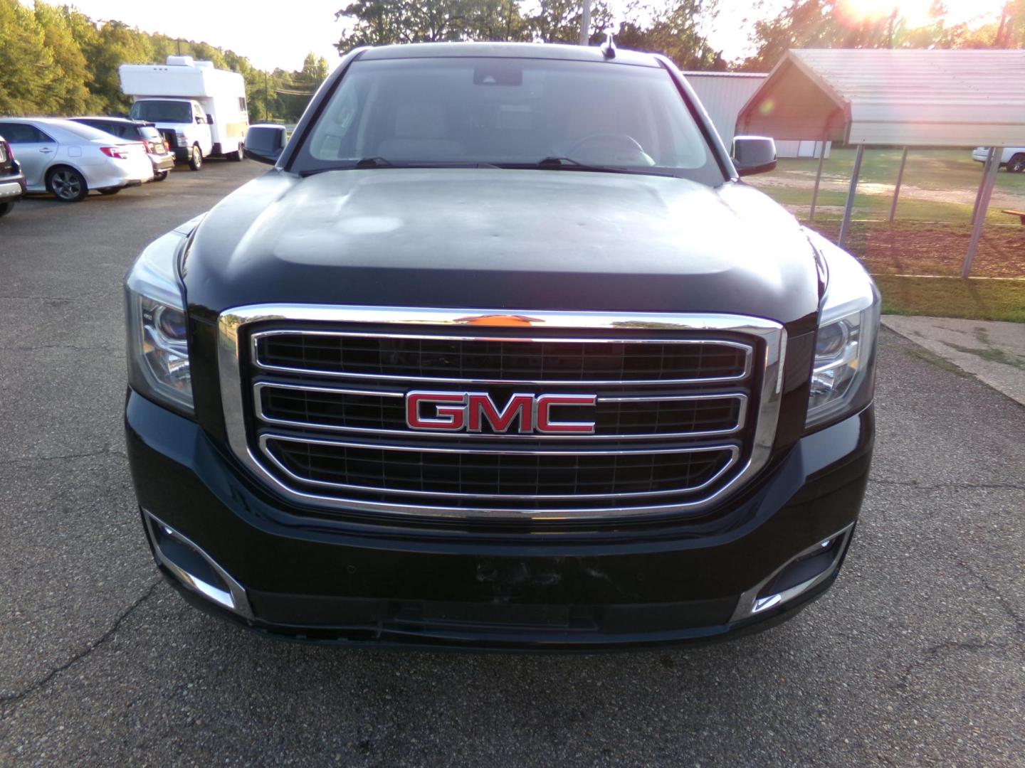 2016 Green With Envy Metallic /Tan GMC Yukon SLE 4WD (1GKS2AKC8GR) with an 5.3L V8 OHV 16V engine, 6A transmission, located at 401 First NE, Bearden, AR, 71720, (870) 687-3414, 33.726528, -92.611519 - Photo#25