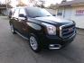 2016 Green With Envy Metallic /Tan GMC Yukon SLE 4WD (1GKS2AKC8GR) with an 5.3L V8 OHV 16V engine, 6A transmission, located at 401 First NE, Bearden, AR, 71720, (870) 687-3414, 33.726528, -92.611519 - Photo#26
