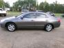 2006 Desert Silver Metallic /Tan Honda Accord EX-L Sedan AT (1HGCM56746A) with an 2.4L L4 DOHC 16V engine, 5-Speed Automatic Overdrive transmission, located at 401 First NE, Bearden, AR, 71720, (870) 687-3414, 33.726528, -92.611519 - Photo#1