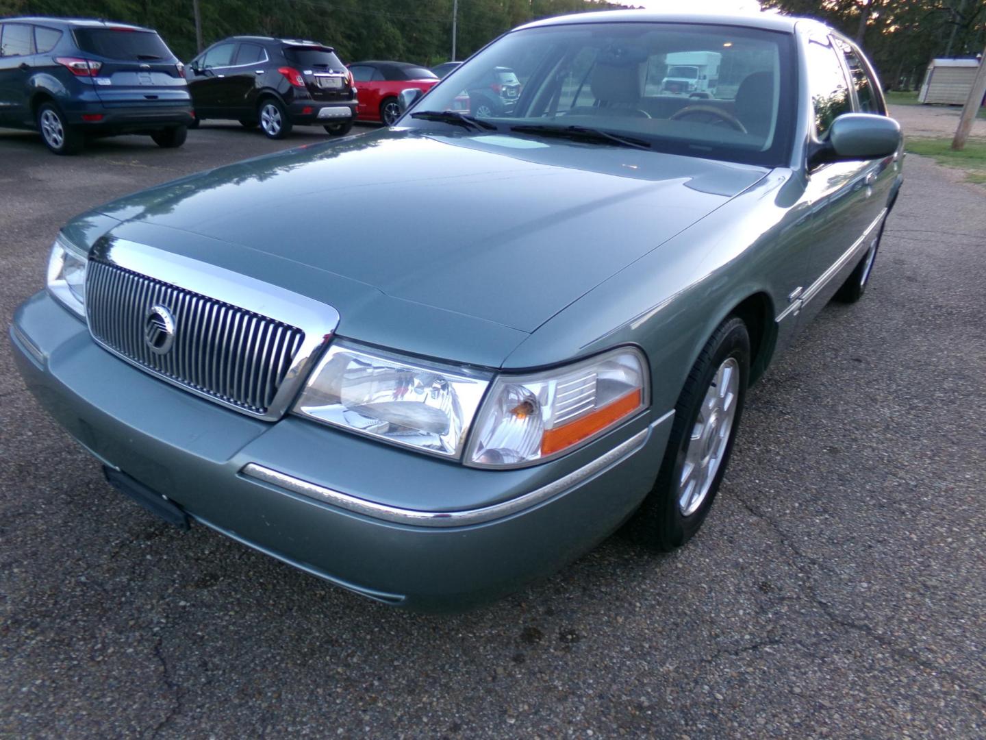 2005 Light Tundra Metallic /Tan Mercury Grand Marquis LS Premium (2MEHM75W25X) with an 4.6L V8 OHC 16V engine, 4-Speed Automatic Overdrive transmission, located at 401 First NE, Bearden, AR, 71720, (870) 687-3414, 33.726528, -92.611519 - Photo#0