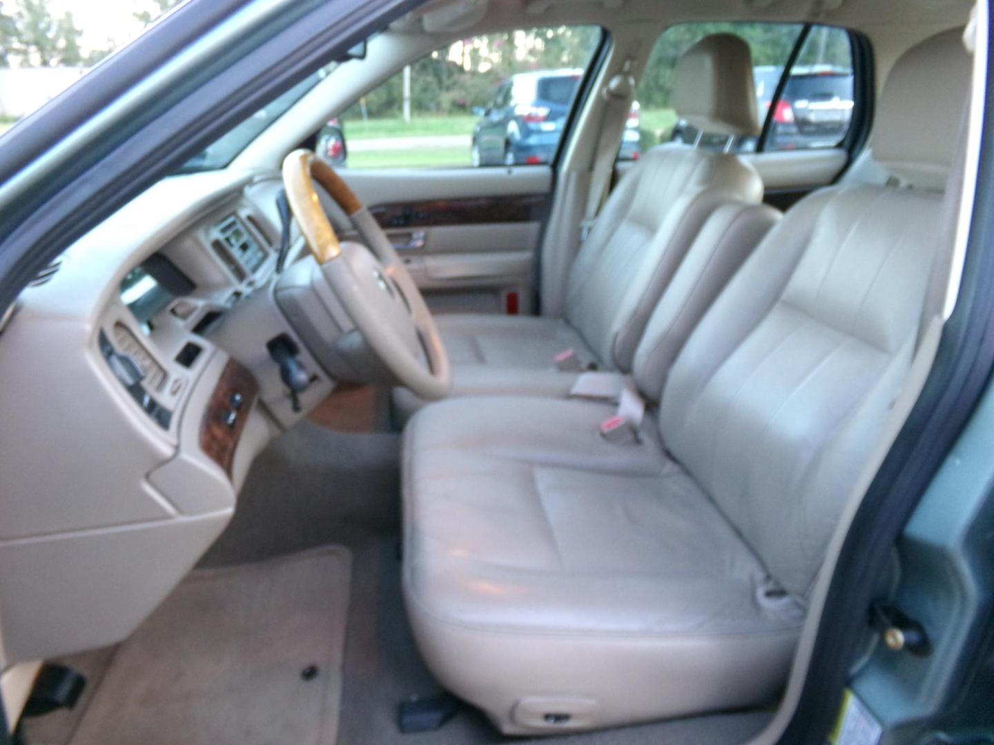 2005 Light Tundra Metallic /Tan Mercury Grand Marquis LS Premium (2MEHM75W25X) with an 4.6L V8 OHC 16V engine, 4-Speed Automatic Overdrive transmission, located at 401 First NE, Bearden, AR, 71720, (870) 687-3414, 33.726528, -92.611519 - Photo#8