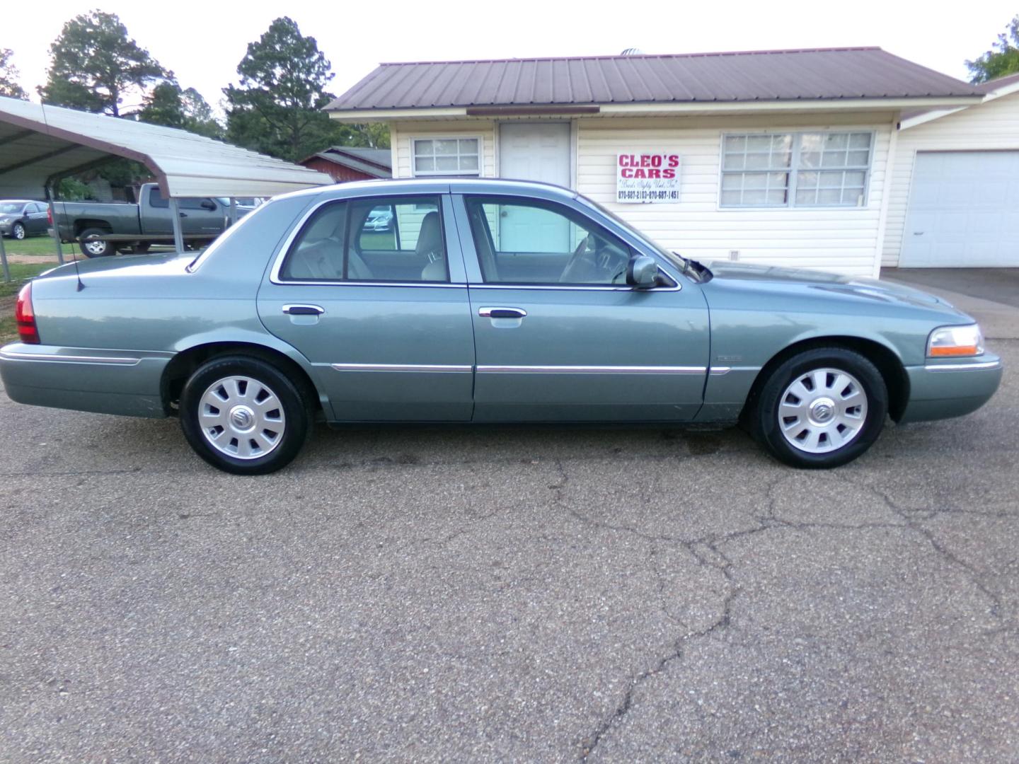 2005 Light Tundra Metallic /Tan Mercury Grand Marquis LS Premium (2MEHM75W25X) with an 4.6L V8 OHC 16V engine, 4-Speed Automatic Overdrive transmission, located at 401 First NE, Bearden, AR, 71720, (870) 687-3414, 33.726528, -92.611519 - Photo#21