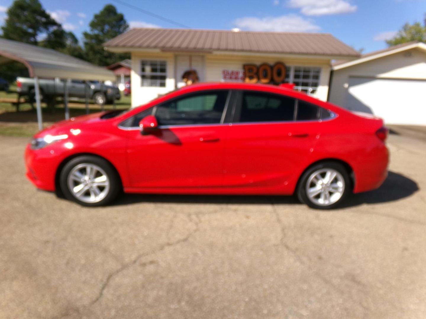 2018 Torch Red /Black Chevrolet Cruze LT Auto (1G1BE5SM9J7) with an 1.4L L4 DOHC 16V TURBO engine, 6A transmission, located at 401 First NE, Bearden, AR, 71720, (870) 687-3414, 33.726528, -92.611519 - Photo#1