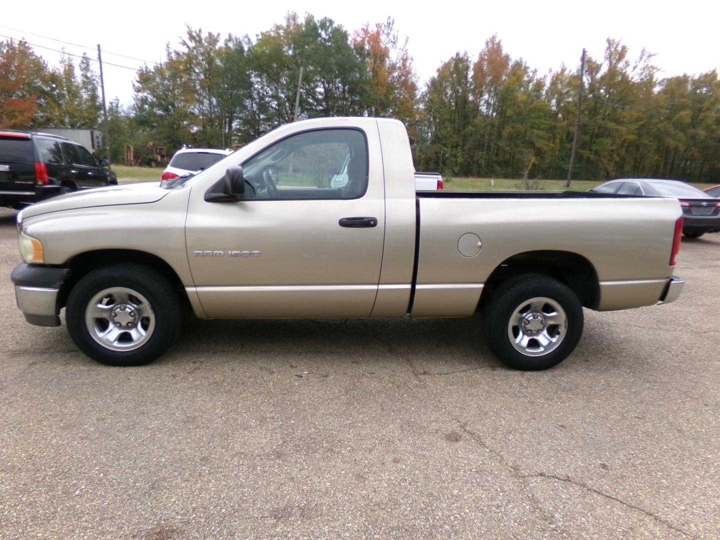 2002 Gold /Tan Dodge Ram 1500 SLT Long Bed 2WD (1D7HA16K52J) with an 3.7L V6 SOHC 12V engine, Automatic transmission, located at 401 First NE, Bearden, AR, 71720, (870) 687-3414, 33.726528, -92.611519 - Photo#1