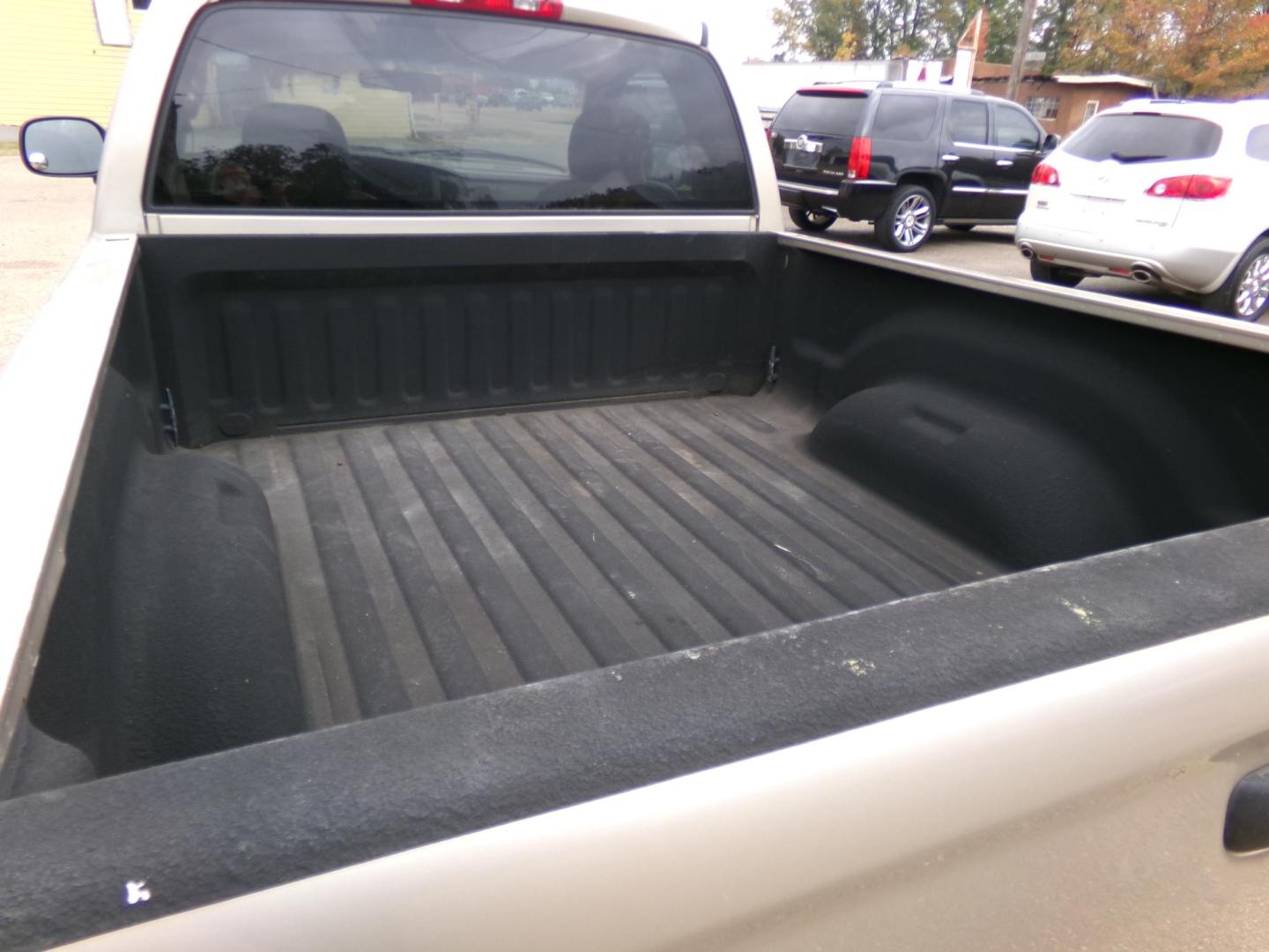 2002 Gold /Tan Dodge Ram 1500 SLT Long Bed 2WD (1D7HA16K52J) with an 3.7L V6 SOHC 12V engine, Automatic transmission, located at 401 First NE, Bearden, AR, 71720, (870) 687-3414, 33.726528, -92.611519 - Photo#3