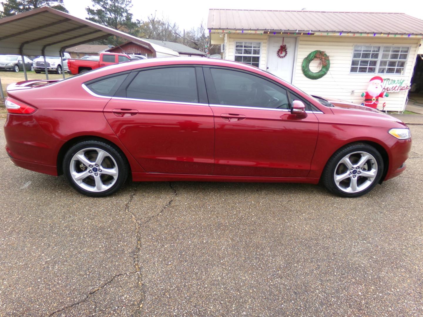2016 Dynamic Red Metallic /Black Ford Fusion SE (3FA6P0HD8GR) with an 1.5L L4 DOHC 16V engine, 6-Speed Automatic transmission, located at 400 First NW, Bearden, AR, 71720, (870) 687-3414, 0.000000, 0.000000 - Photo#25