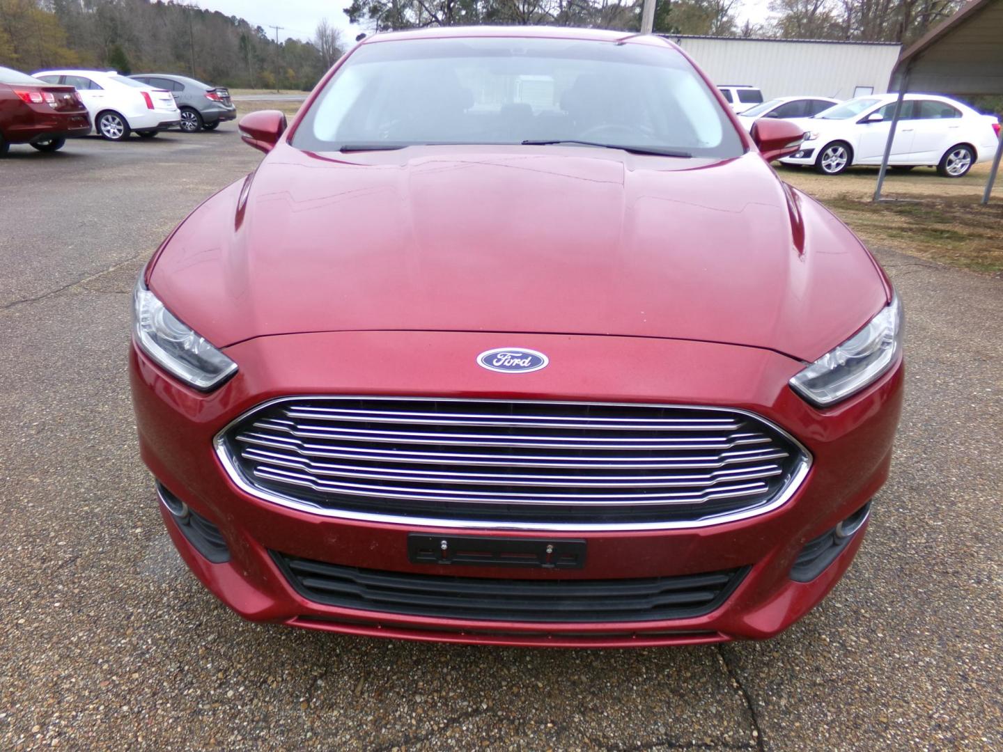 2016 Dynamic Red Metallic /Black Ford Fusion SE (3FA6P0HD8GR) with an 1.5L L4 DOHC 16V engine, 6-Speed Automatic transmission, located at 400 First NW, Bearden, AR, 71720, (870) 687-3414, 0.000000, 0.000000 - Photo#26