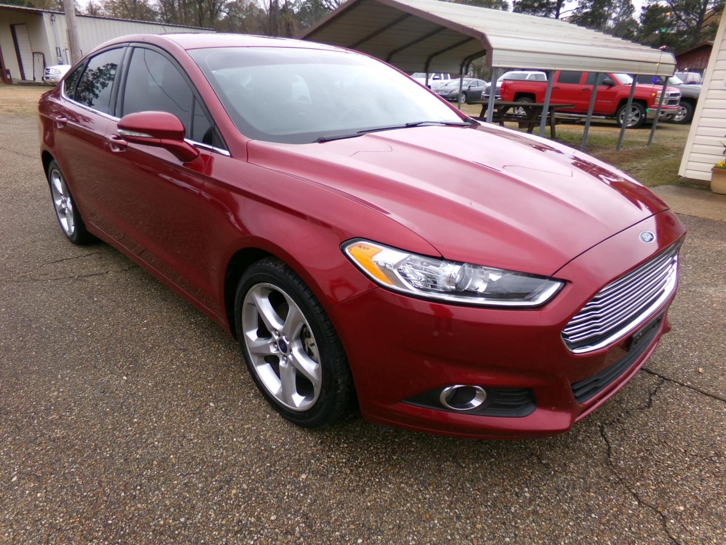 2016 Dynamic Red Metallic /Black Ford Fusion SE (3FA6P0HD8GR) with an 1.5L L4 DOHC 16V engine, 6-Speed Automatic transmission, located at 400 First NW, Bearden, AR, 71720, (870) 687-3414, 0.000000, 0.000000 - Photo#27