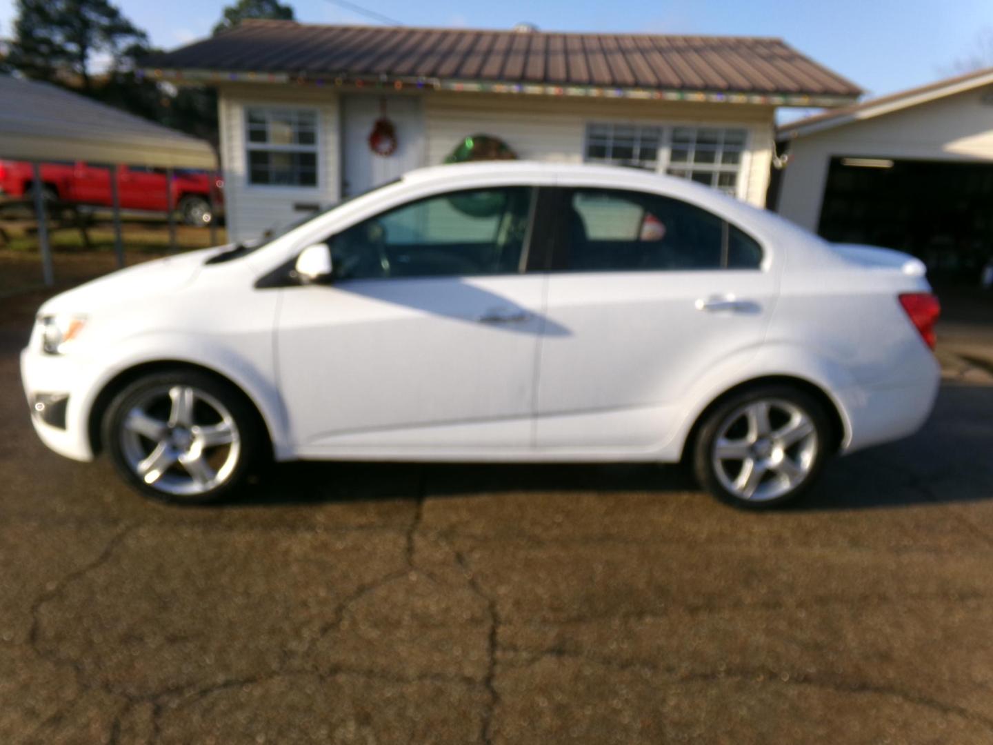 2016 White /Gray Chevrolet Sonic LTZ Auto Sedan (1G1JE5SB8G4) with an 1.4L L4 DOHC 24V TURBO engine, 6A transmission, located at 400 First NW, Bearden, AR, 71720, (870) 687-3414, 0.000000, 0.000000 - Photo#1