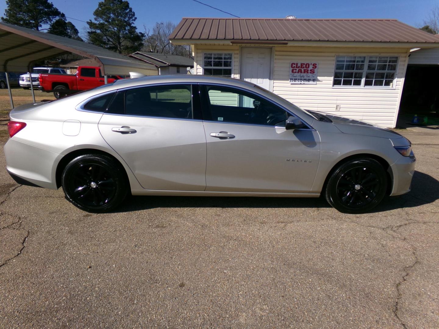 2016 Champagne Silver Metallic /Black Chevrolet Malibu 1LT (1G1ZE5ST6GF) with an 1.5L L4 DOHC 16V engine, 6A transmission, located at 400 First NW, Bearden, AR, 71720, (870) 687-3414, 0.000000, 0.000000 - Photo#1