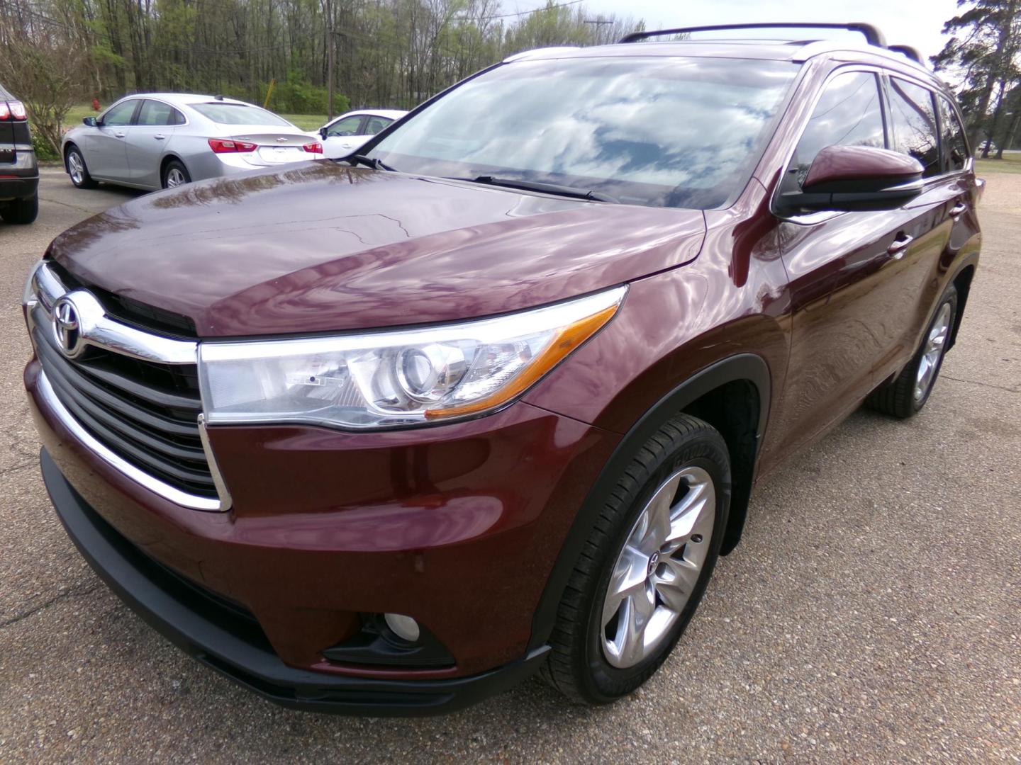 2016 Ooh La La Rouge Mica /Black Toyota Highlander Limited AWD V6 (5TDDKRFH0GS) with an 3.5L V6 DOHC 24V engine, 6-speed automatic transmission, located at 400 First NW, Bearden, AR, 71720, (870) 687-3414, 0.000000, 0.000000 - Photo#0