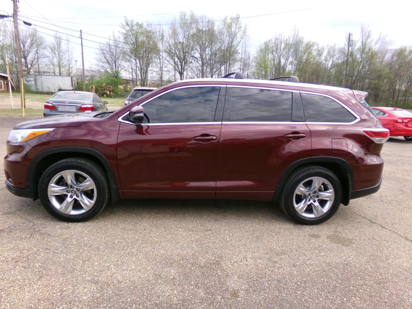 2016 Ooh La La Rouge Mica /Black Toyota Highlander Limited AWD V6 (5TDDKRFH0GS) with an 3.5L V6 DOHC 24V engine, 6-speed automatic transmission, located at 400 First NW, Bearden, AR, 71720, (870) 687-3414, 0.000000, 0.000000 - Photo#1